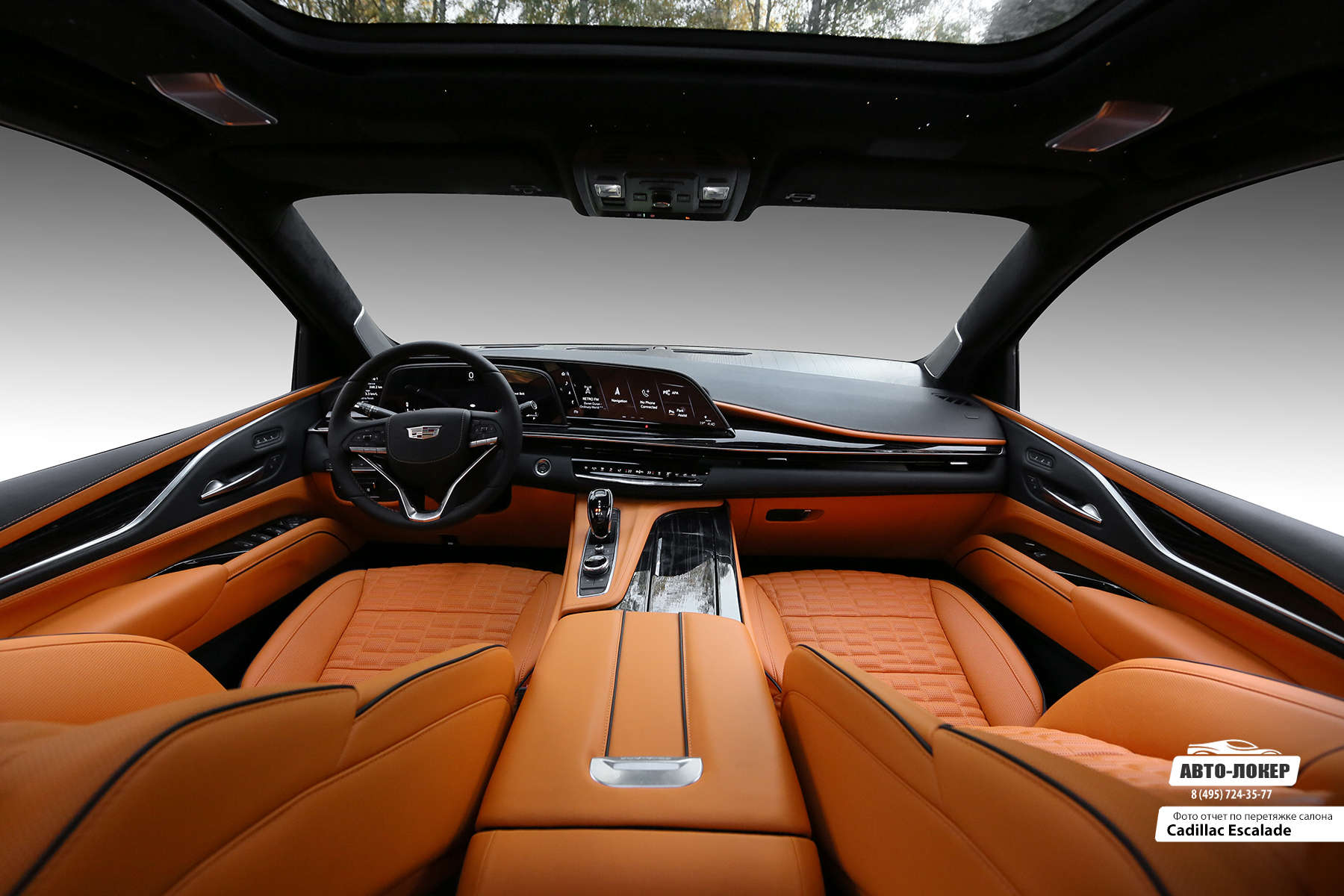 Перетяжка сидений, центральной консоли, торпедо и дверей оранжевой кожей салона Cadillac Escalade Mandarin