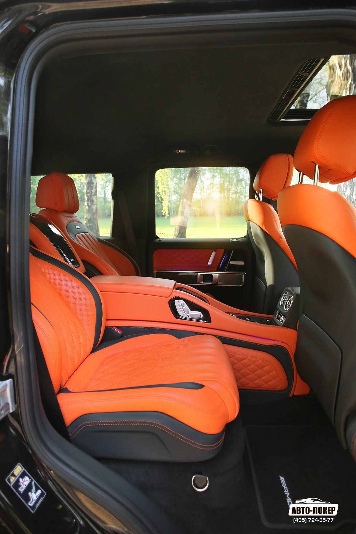 Перетяжка задних сидений и комфортного узла оранжевой кожей салона MB Gelandewagen MBS
